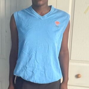 Blue ashworth vest with an embroidered emblem